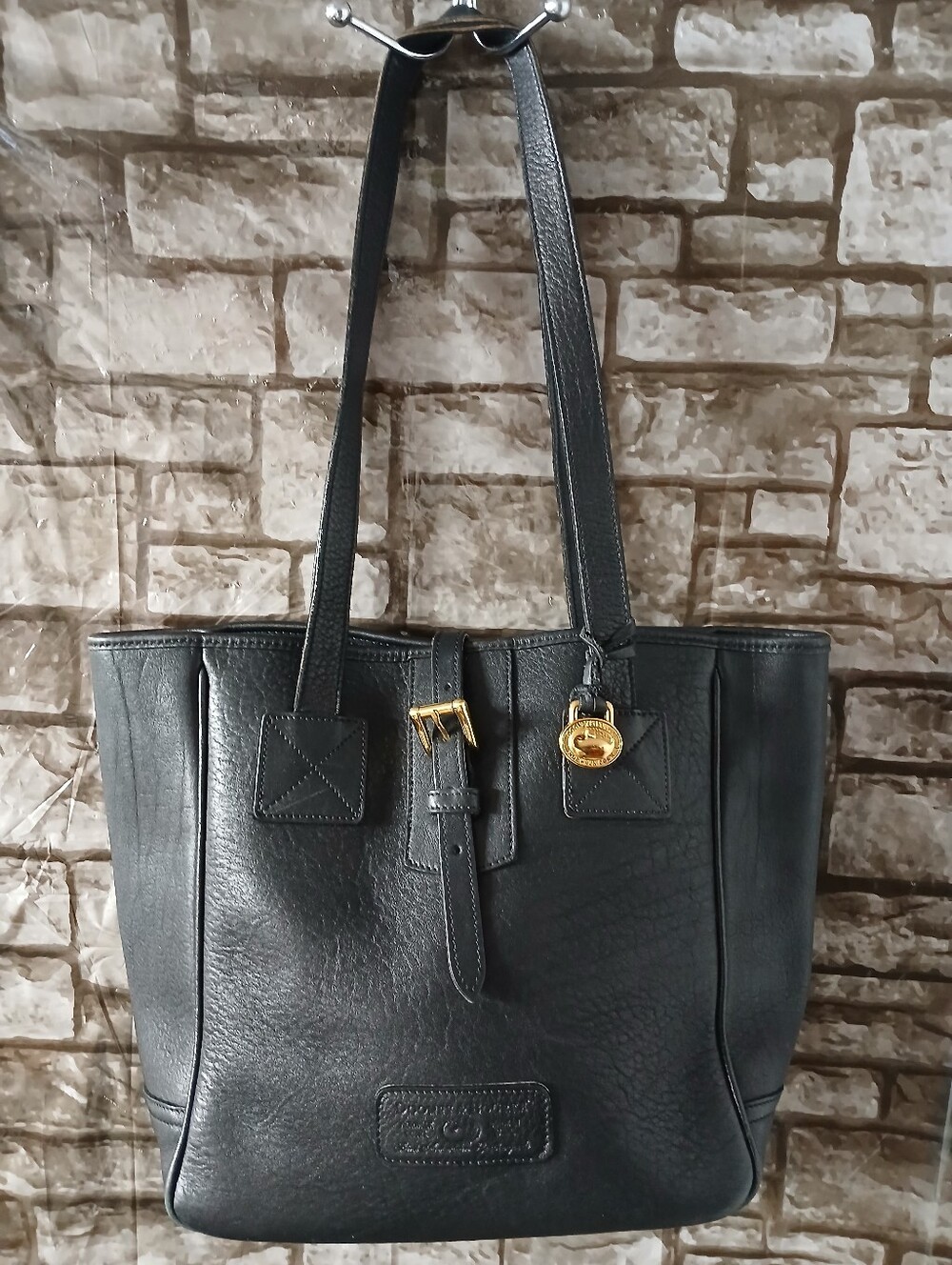 Dooney & Bourke Black Leather Tote with Gold Charm